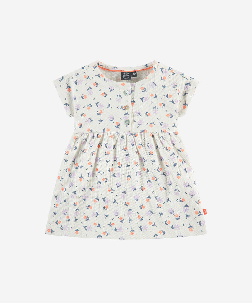 Details: Short sleeve dress with all over print flowers. Button closure on the front. Round Neckline.  Color: Ivory  Composition:   96% cotton/3% polyester/1% elasthan  