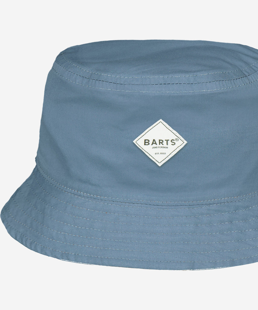 Details:The Antigua Hat Kids is a cotton bucket hat for children and can be worn inside out. Lined with cotton and available in all kinds of cheerful prints. Sizing:  50cm - Age: 1,5-3Y  53cm - Age: 4-8Y  Color: old blue   Composition: 100% cotton 
