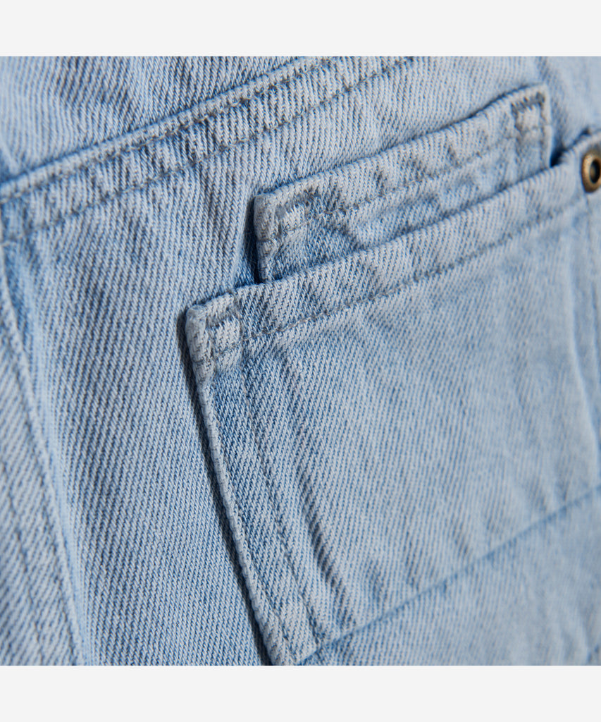 Details: Jeans shorts with pockets front, back and belt loops. Zip and button closure.   Color: Light denim blue  Composition:  100% Cotton  