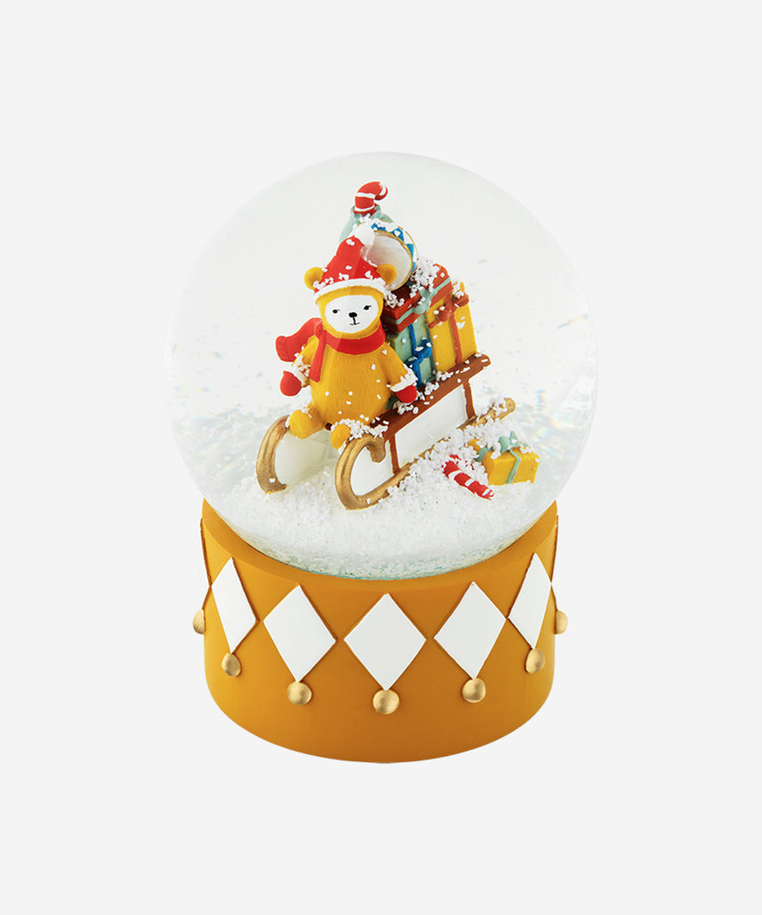 Fabelab  This beautiful Snow Globe from Fabelab would make a truly magical and treasured gift that will be brought out year after year!  It's hard to get enough of Fabelab's gorgeous snow globe! The sweet Fabelab character Buddy Bob at the centre of his own little sleigh ride universe. Shake to snow globe to swirl up a blizzard that engulfs him in the magical winter wonderland!   Size: 10 x 10 x 13 cm  Material: Polyresin, water, glas  Designed in Denmark 