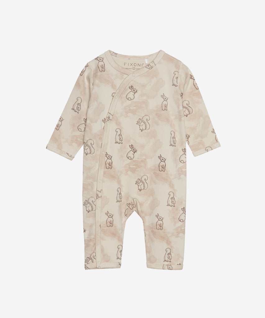 Details: Long sleeved baby-night-suit with all over print bunnys, push buttons and round neckline.  Color: fog  Composition: 100% Cotton  