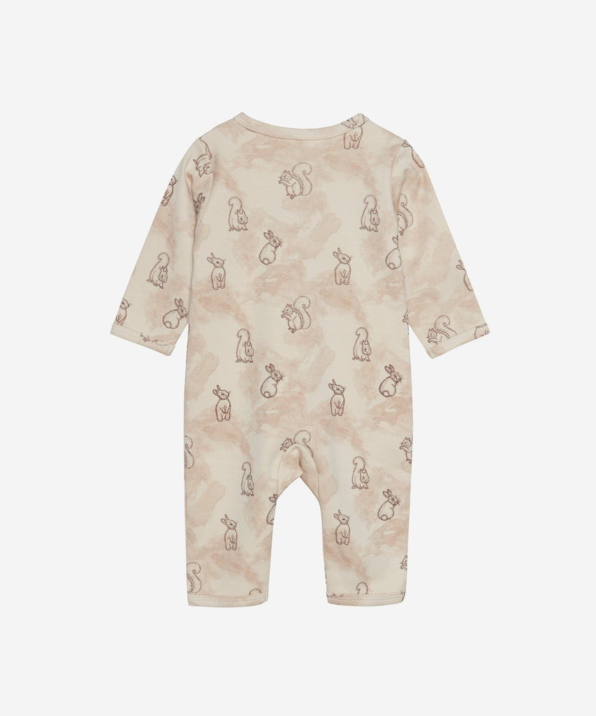 Details: Long sleeved baby-night-suit with all over print bunnys, push buttons and round neckline.  Color: fog  Composition: 100% Cotton  