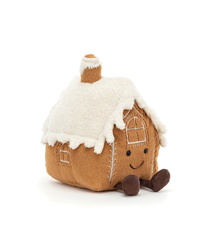 JellyCat London  Sugar and spice and a smile to melt the ice!  Chunky, cheery and full of chuckles, Amuseable Gingerbread House brings the party! This kooky cottage has embroidered icing and a snowy roof of buttercream fur. Kicking up those chocolate cord boots, our happy house is full of holiday hugs. Anyone for cookies?    Suitable from birth. 20 x16 cm