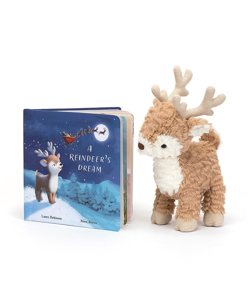 JellyCat London  Go, Mitzi, go!  In A Reindeer's Dream, little Mitzi shares her hopes of joining Santa's sleigh team. A gorgeous chunky hardback book with a wonderland of pictures, this snowy-sweet story is about trying your best, helping your friends, persevering and finally taking flight.  (Stuffed Reindeer not included)  Suitable from birth.  21 x21cm 