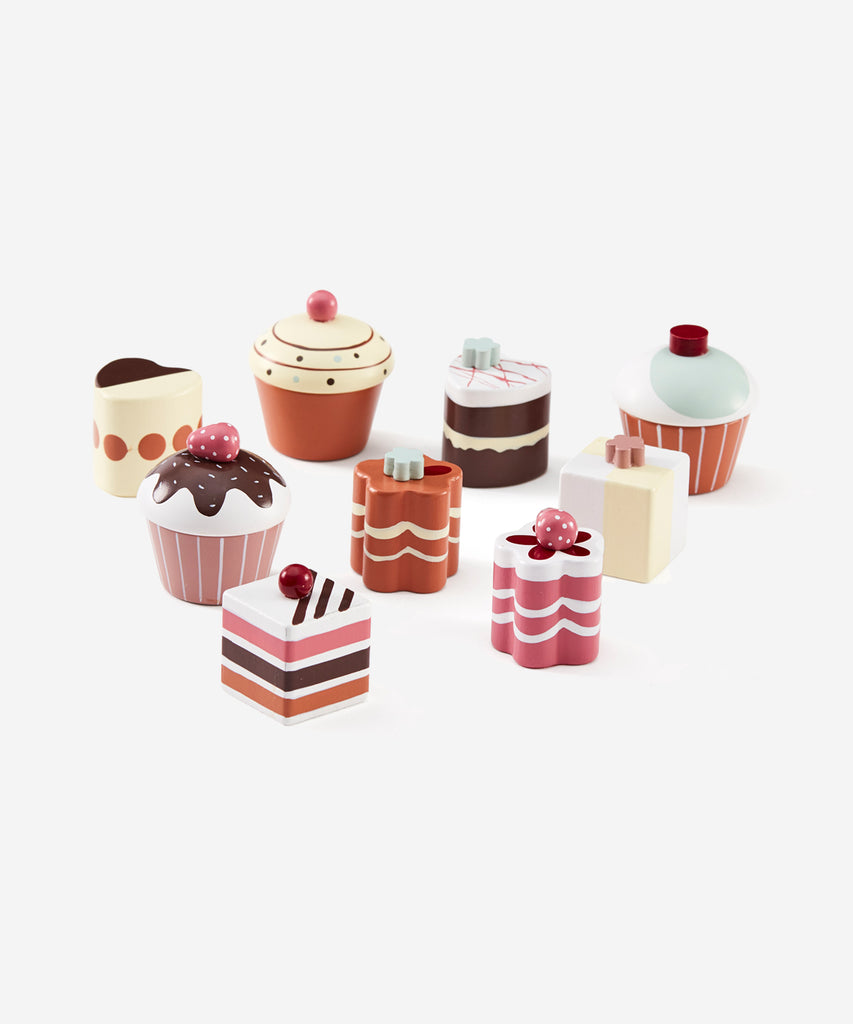 Kid's Concept  Deliciously designed wooden play pastries. Invite all our best friends for an afternoon tea party.  Age: 3y+  Size: 9 pastry pieces.  Color: Multi pastel  Composition: Shima, mdf, plywood. 