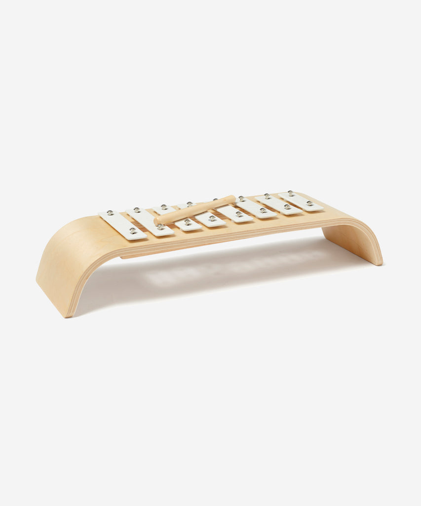 Kid's Concept  Toy xylophone in natural stained plywood with keys in white. Perfect for children who love music or to create an interest in music. Start up a small band.  Age: 18m+  Size: 36 x 11.5 x 6.5cm, Stick 12cm