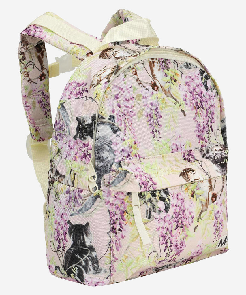 MOLO  Rucksack in lavender with a print of clumsy cuteness kittens. It has an exterior pocket, a front buckle on the chest, a handle and adjustable straps. This Molo product is recycled and constructed in reusable polyester