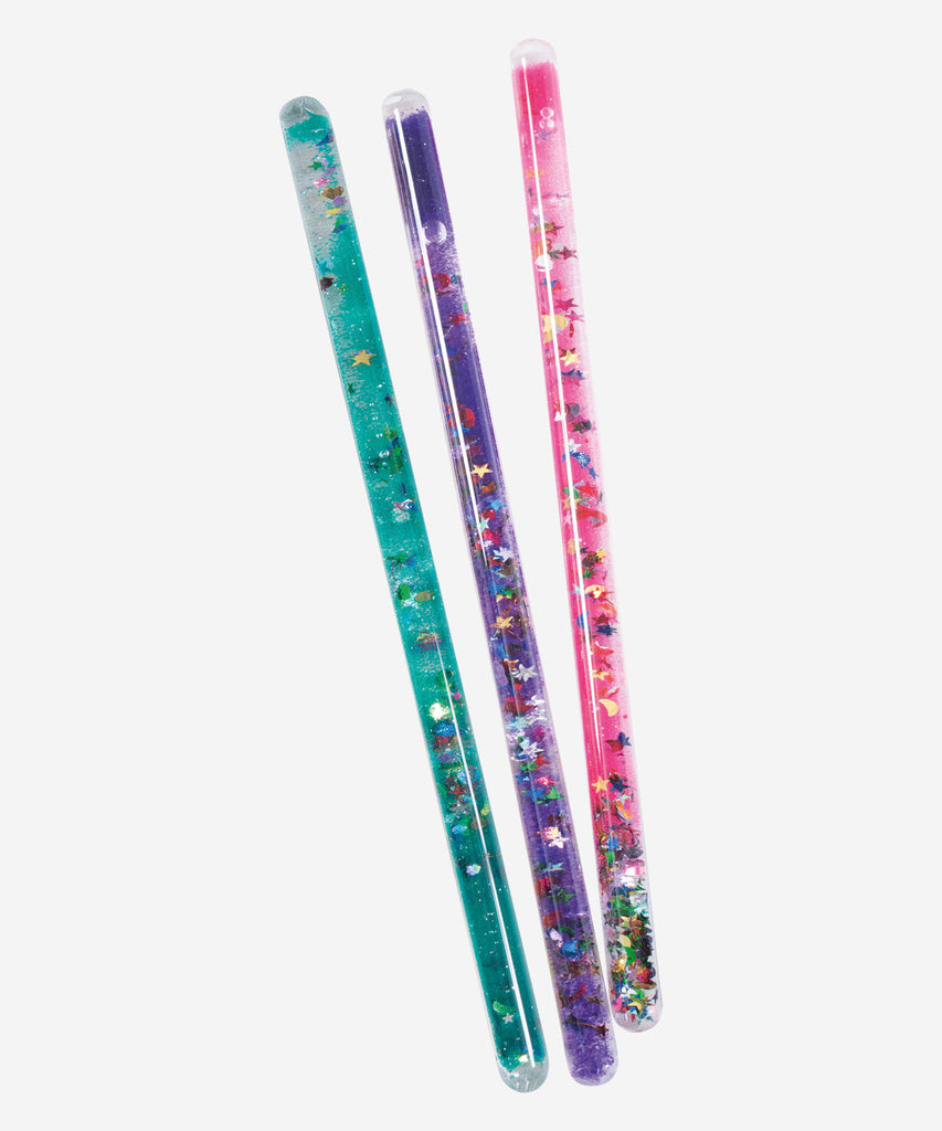 MOULIN ROTY  Magic wand, each slipped into a tulle case and tied with a satin ribbon, made of a plastic tube containing a colourful gel and a multitude of sequins. Let the magic begin.   Collection's history Il était une fois... Far in the woods, you will find Mr Fox and a gentle wolf, Little Red Riding Hood and an Enchanted Princess… Let’s follow them to their fairytale, magical, poetic world …   Age: 3+ Color: glitter purple  Size: 20cm Composition: Acrylique