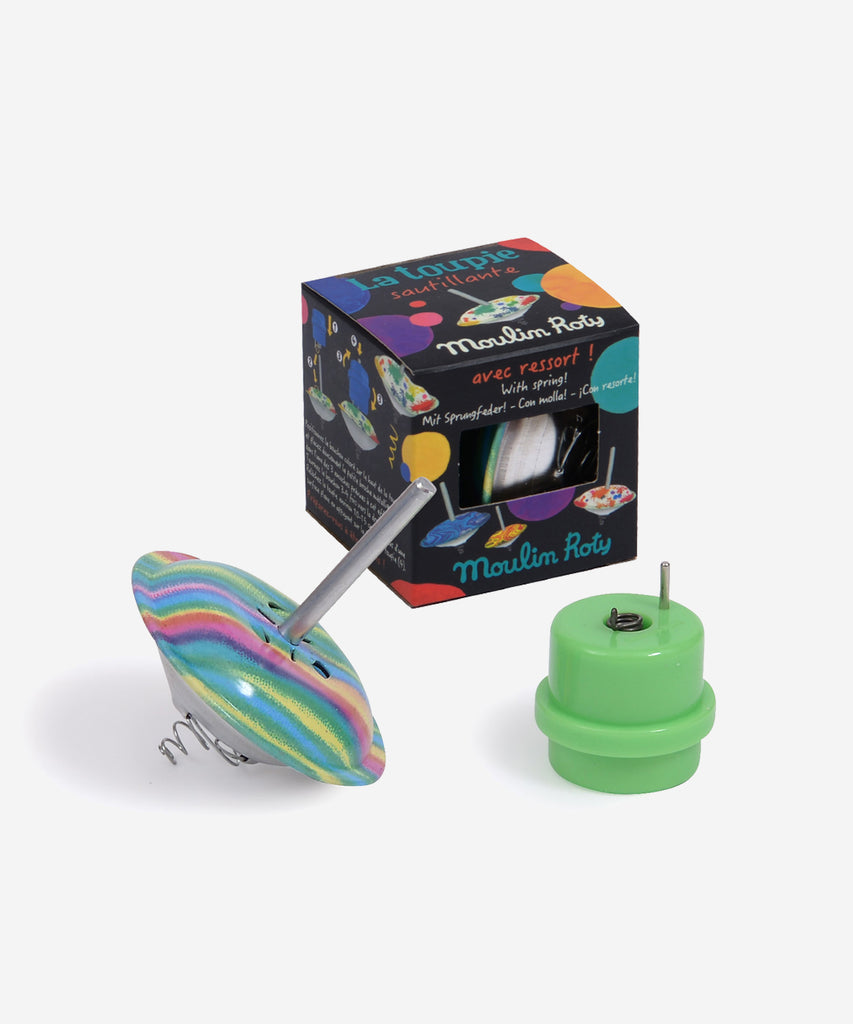 711145MOULIN ROTY  This spinning top has a built-in spring so it spins and bounces at the same time!  Collection's history Les Petites Merveilles... Little nothings for big play; invent a thousand and one different marvels …  Age: 3+ Color: multi  Size: 6cm Composition: metal & plastic