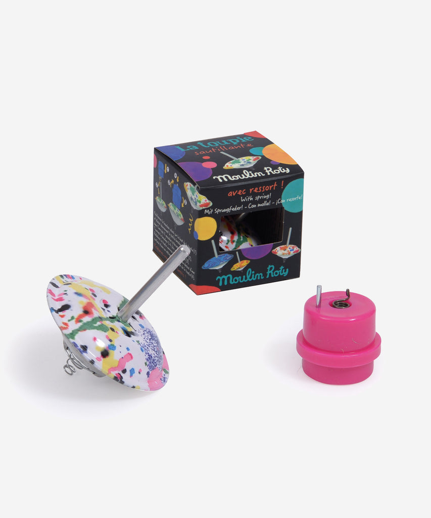 MOULIN ROTY  Thee spinning top has a built-in spring so it spins and bounces at the same time!  Collection's history Les Petites Merveilles... Little nothings for big play; invent a thousand and one different marvels …  Age: 3+ Color: multi white Size: 6cm Composition: metal & plastic