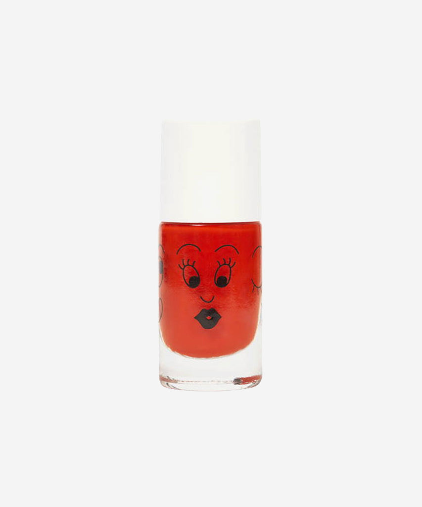 Nailmatic  Dori is a wacky polish that will reel you in with its tropical colour! This punchy orange will delight even the boldest and brightest little ones. With its water-based formula, Dori is especially made for children.