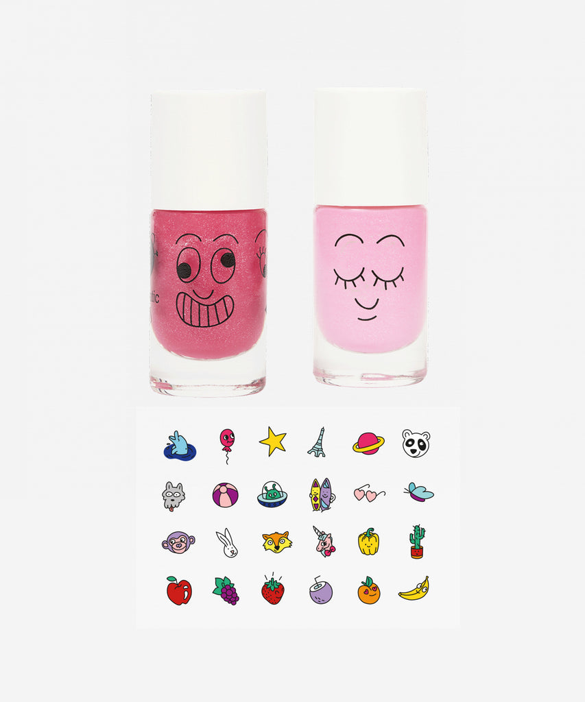 Nailmatic POP means loads of fairy times in our world. With this duo of pink polishes, along with a pack of nail stickers, the kids will be thrilled!!  100% Kids, 100% Fun set: - 2 water-based nail polishes : Dolly (pearly neon pink) + Kitty (candy pink glitter) - Easy-to-use nail 24 stickers sheet with colourful designs