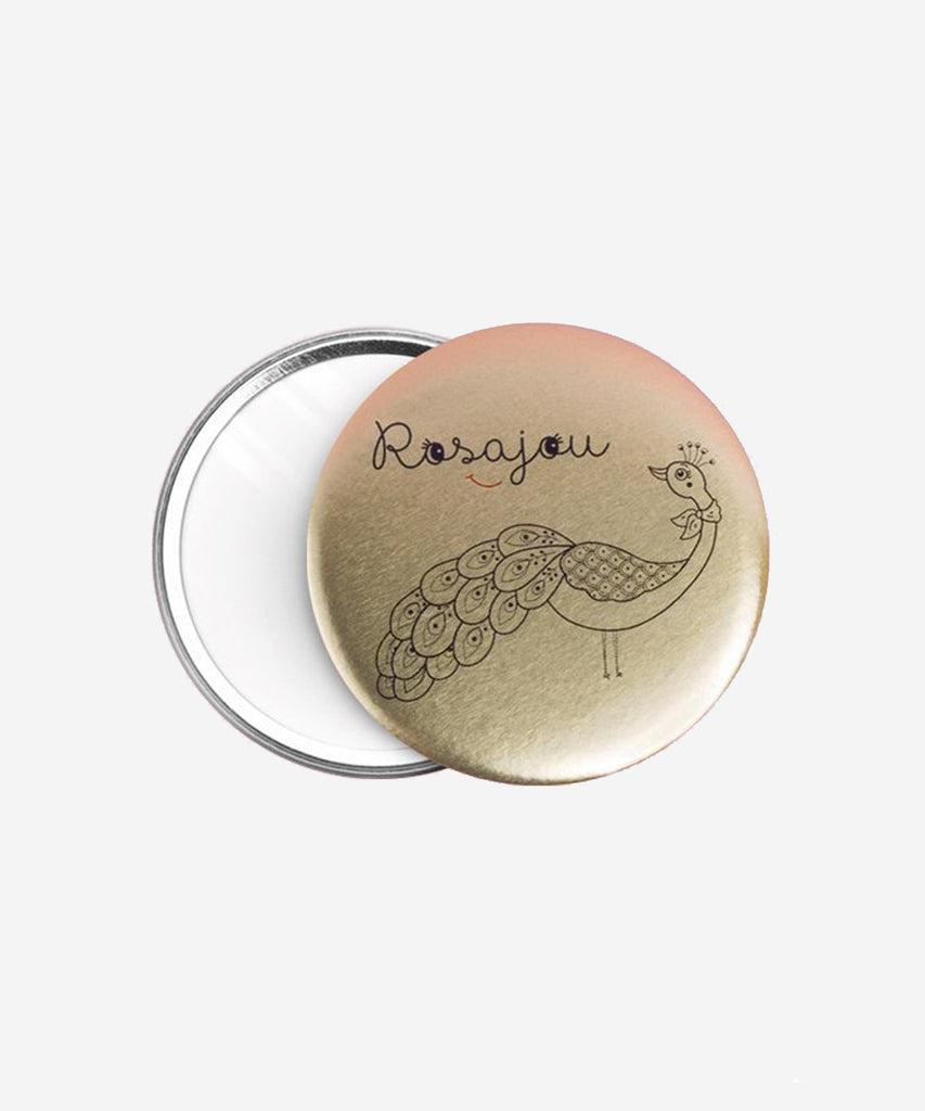 Rosajou  A handy and cute little pocket mirror. One side a mirror the other side a pretty gold peacock.  Color: Gold  Size: 5,6cm 