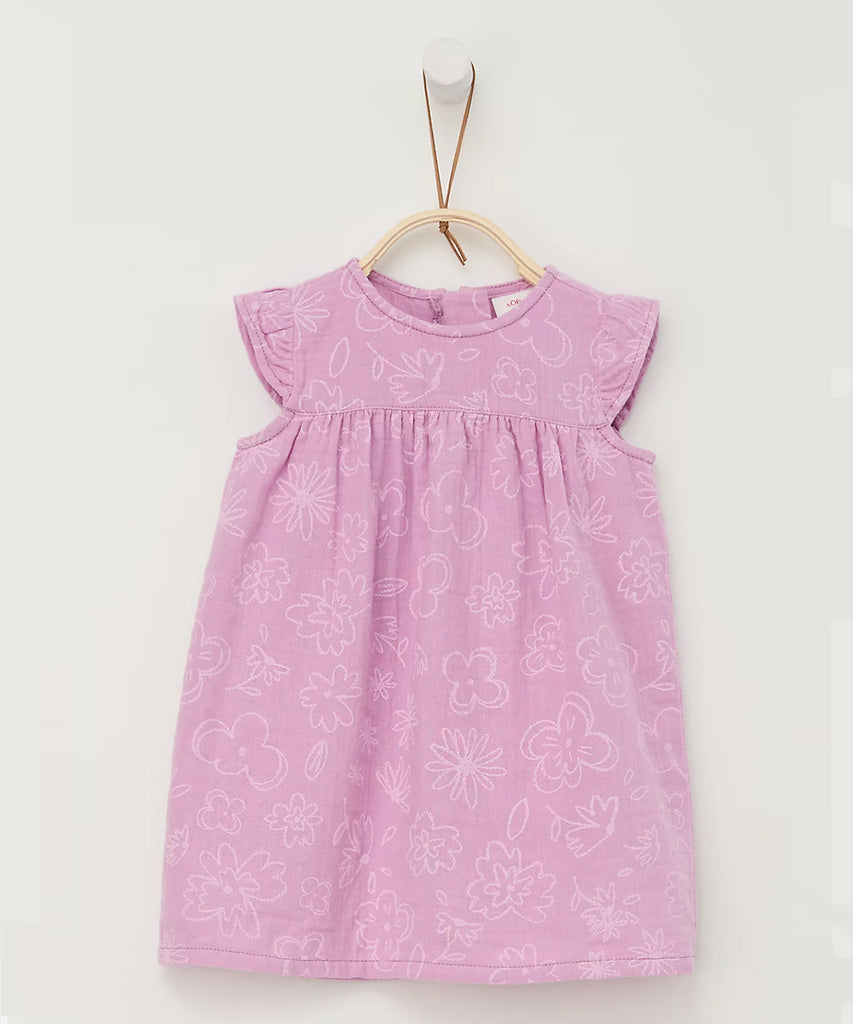 Details:  Short sleeve dress with all over flowers printed. Round neckline.  Color: Lilac pink  Composition:  CO100%